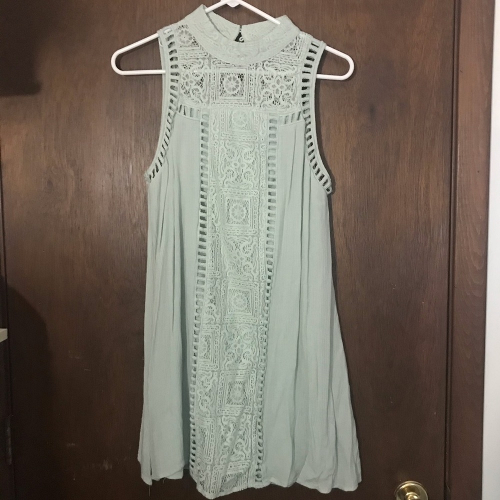 Medium mint green flowy dress.